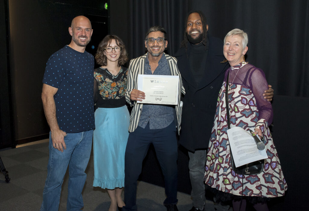 Johan Nayar accepting the Audience Award for Best Documentary at London Breeze Film Festival
